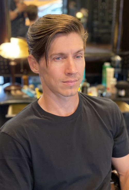 Classic side-part men's haircut by PRK Hair Salon